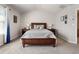 Charming main bedroom is enhanced with neutral walls, a bed, and a warm, inviting ambiance at 2293 Baker Station Dr, Acworth, GA 30101