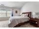 Inviting main bedroom showcases soft carpeting, a large bed, and a tranquil atmosphere for relaxation at 2293 Baker Station Dr, Acworth, GA 30101