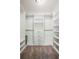Walk-in closet with custom shelving and ample storage space, providing an organized solution at 2710 Hayden Dr, East Point, GA 30344