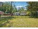 Charming two-story home features a fenced yard and fresh exterior paint at 2710 Hayden Dr, East Point, GA 30344