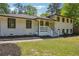 Inviting two-story home with freshly painted brick, black trim, and a charming entrance at 2710 Hayden Dr, East Point, GA 30344