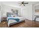 Serene bedroom with a large bed, ample natural light, and a closet at 335 Amberidge Trl, Atlanta, GA 30328