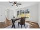 Bright office space with a large window, hardwood floors, and a functional desk area at 335 Amberidge Trl, Atlanta, GA 30328