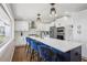 Stylish kitchen boasts a large island with bar seating, stainless steel appliances, and modern fixtures at 335 Amberidge Trl, Atlanta, GA 30328