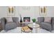 Cozy living room featuring a modern fireplace, hardwood floors, and comfortable seating at 335 Amberidge Trl, Atlanta, GA 30328