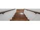 Staircase featuring hardwood steps and a white stairwell at 335 Amberidge Trl, Atlanta, GA 30328