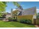Well-maintained backyard with lush lawn, landscaping, and an outdoor deck for relaxation at 431 Shore Dr, Suwanee, GA 30024