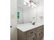 Bright bathroom with a vanity, modern fixtures, and a well-lit mirror at 431 Shore Dr, Suwanee, GA 30024