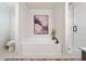 Elegant bathroom featuring a modern tub, sleek fixtures, and a separate glass shower at 431 Shore Dr, Suwanee, GA 30024