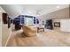 Bonus room with a fan, blue shelving, large windows and a couch at 431 Shore Dr, Suwanee, GA 30024