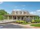 Community clubhouse featuring a covered porch, offering a comfortable space for gatherings and events at 431 Shore Dr, Suwanee, GA 30024