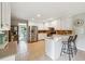 This kitchen features a breakfast bar, stainless steel appliances, and ample counter space at 431 Shore Dr, Suwanee, GA 30024