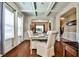 Lovely dining space with hardwood floors, white trim and abundant natural light at 5447 Stirrup Way, Powder Springs, GA 30127