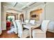 Formal dining area featuring hardwood floors, coffered ceiling and open layout at 5447 Stirrup Way, Powder Springs, GA 30127