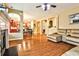 Spacious living room with fireplace, open to dining and kitchen at 5447 Stirrup Way, Powder Springs, GA 30127