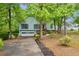Two-story home with landscaping and driveway at 865 Turner Dr, Lawrenceville, GA 30046