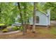 Two-story home with landscaping and walkway at 865 Turner Dr, Lawrenceville, GA 30046