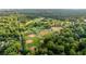 Aerial view of several ball fields with lush green surroundings and a golf course in the distance at 5260 Long Island Nw Dr, Atlanta, GA 30327