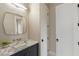 Bathroom with marble countertop and modern fixtures at 5260 Long Island Nw Dr, Atlanta, GA 30327