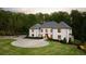 Stunning two-story home with a circular driveway and beautiful landscaping at 5260 Long Island Nw Dr, Atlanta, GA 30327