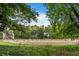 Serene view of the horse park framed by lush trees, showcasing a well-equipped equestrian facility at 5260 Long Island Nw Dr, Atlanta, GA 30327