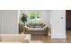 Bright living room with a large window, comfortable seating, and stylish decor at 5260 Long Island Nw Dr, Atlanta, GA 30327