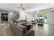 Spacious living room with sliding glass doors, modern decor, and ample natural light, ideal for relaxation at 5260 Long Island Nw Dr, Atlanta, GA 30327
