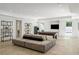 Spacious living room with a pool table, entertainment center and lots of natural light at 5260 Long Island Nw Dr, Atlanta, GA 30327