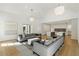 Open concept living area seamlessly connects with a state-of-the-art kitchen, ideal for modern living at 5260 Long Island Nw Dr, Atlanta, GA 30327
