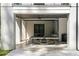 Outdoor space featuring a ping pong table and fully-equipped kitchen with barstool seating at 5260 Long Island Nw Dr, Atlanta, GA 30327