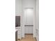 Bright pantry with white cabinetry offering ample storage and maximizing space in a sleek design at 5260 Long Island Nw Dr, Atlanta, GA 30327
