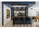 Sophisticated wet bar featuring a modern design, ideal for entertaining guests in style at 5260 Long Island Nw Dr, Atlanta, GA 30327