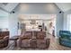 Comfortable living room showcases an open-concept design with modern kitchen and cozy seating at 613 Nebo Rd, Dallas, GA 30157