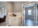 Convenient butler's pantry with storage and a coffee bar, connecting to a walk-in pantry at 613 Nebo Rd, Dallas, GA 30157