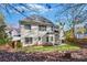 Spacious backyard view of home featuring a patio and well-manicured lawn offering a great space at 893 Brookgreen Pl, Lawrenceville, GA 30043
