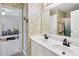 Shared bathroom with double sinks and stylish, modern decor at 893 Brookgreen Pl, Lawrenceville, GA 30043