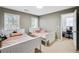 Bright and comfortable bedroom with an attached desk space at 893 Brookgreen Pl, Lawrenceville, GA 30043