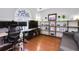 Spacious office featuring a large window, hardwood floors, and ample shelving at 893 Brookgreen Pl, Lawrenceville, GA 30043