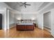 Spacious bedroom with trey ceiling and hardwood floors at 225 Farmbrooke Ct, Sandy Springs, GA 30350