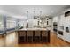 Open kitchen featuring a central island, modern stainless appliances, and hardwood floors at 225 Farmbrooke Ct, Sandy Springs, GA 30350