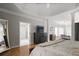 Large main bedroom with sitting area, hardwood floors and elegant details at 225 Farmbrooke Ct, Sandy Springs, GA 30350
