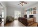 Bright and airy office features a large desk, hardwood floors, and custom furnishings at 225 Farmbrooke Ct, Sandy Springs, GA 30350