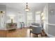 Cozy sitting area features hardwood floors, plantation shutters, and plenty of natural light at 225 Farmbrooke Ct, Sandy Springs, GA 30350