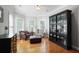 Bright sitting area with hardwood floors and multiple windows at 225 Farmbrooke Ct, Sandy Springs, GA 30350