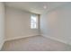 Bright bedroom features plush carpeting, neutral color palette, and recessed lighting at 4730 Montane St, Cumming, GA 30028