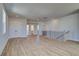 Large open area featuring hardwood floors, hallway access to the bedrooms and baths, and closet space at 4730 Montane St, Cumming, GA 30028