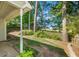 Serene backyard featuring lush greenery and trees, enhanced by a classic wooden fence at 5410 Lenox Park Pl, Buford, GA 30518