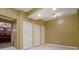 This basement features neutral walls, carpet flooring, and white bifold door storage closet at 5870 Buckner Creek Dr, Mableton, GA 30126