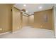 This large basement is carpeted, has recessed lighting, and offers flexible living or storage space at 5870 Buckner Creek Dr, Mableton, GA 30126
