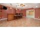 Finished basement with bar and seating at 5870 Buckner Creek Dr, Mableton, GA 30126